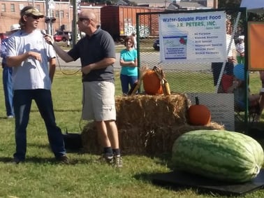 giant watermelon and grower interview at pumpkin festival.jpg